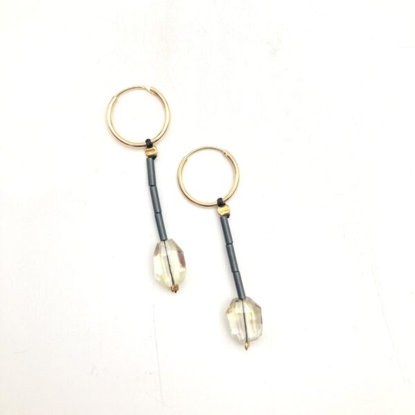 earrings with metallic,golden details and semi-precious stones