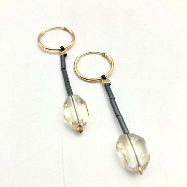 earrings with metallic,golden details and semi-precious stones